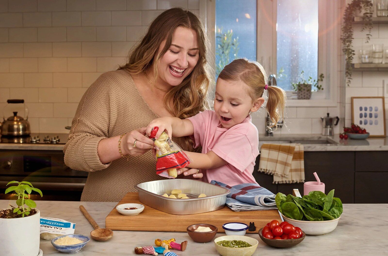 Mother and daughter cooking a Blue Apron recipe