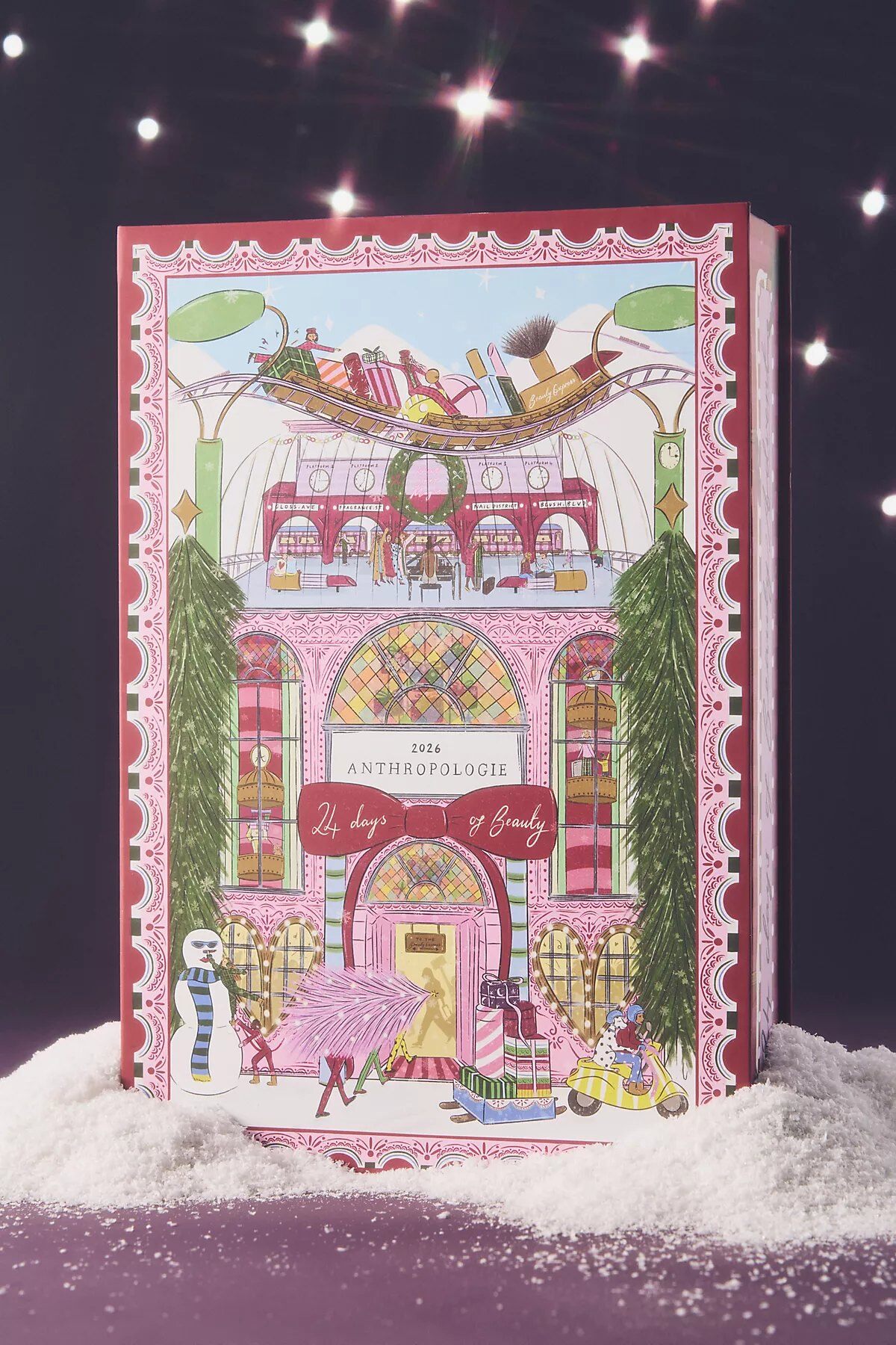 Anthropologie 2026 24 Days of Beauty Advent Calendar box illustrated with a pink holiday station