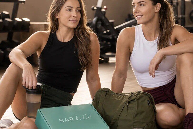 Two women in a gym with a Barbella Box