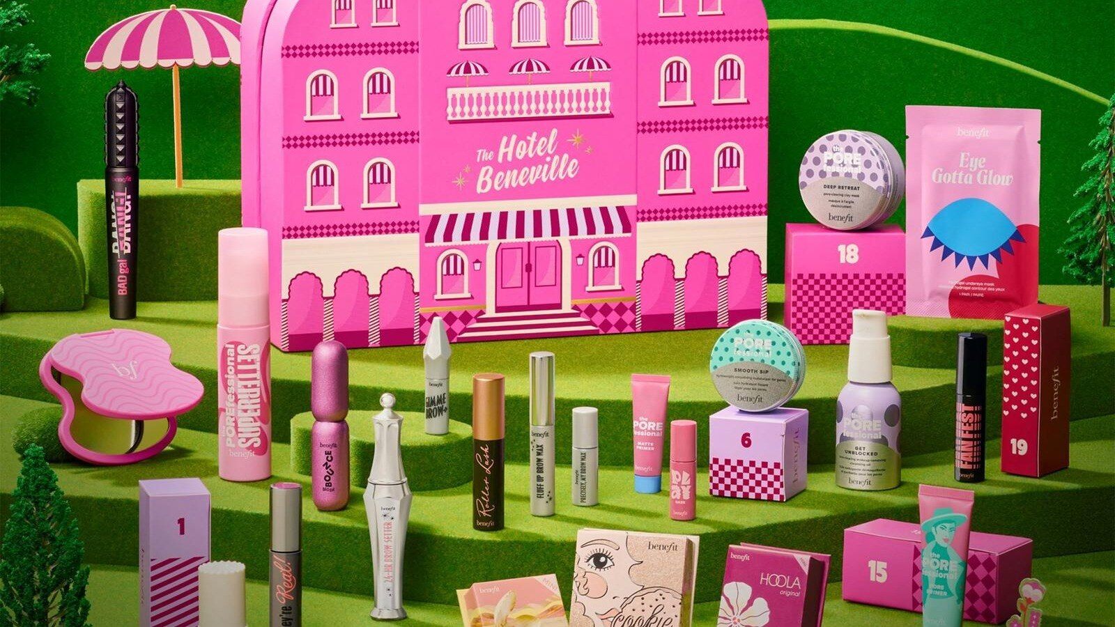 Benefit Hotel Beneville 24-Day Beauty Advent Calendar 2026, a pink hotel on green hills surrounded by Benefit mascaras and minis