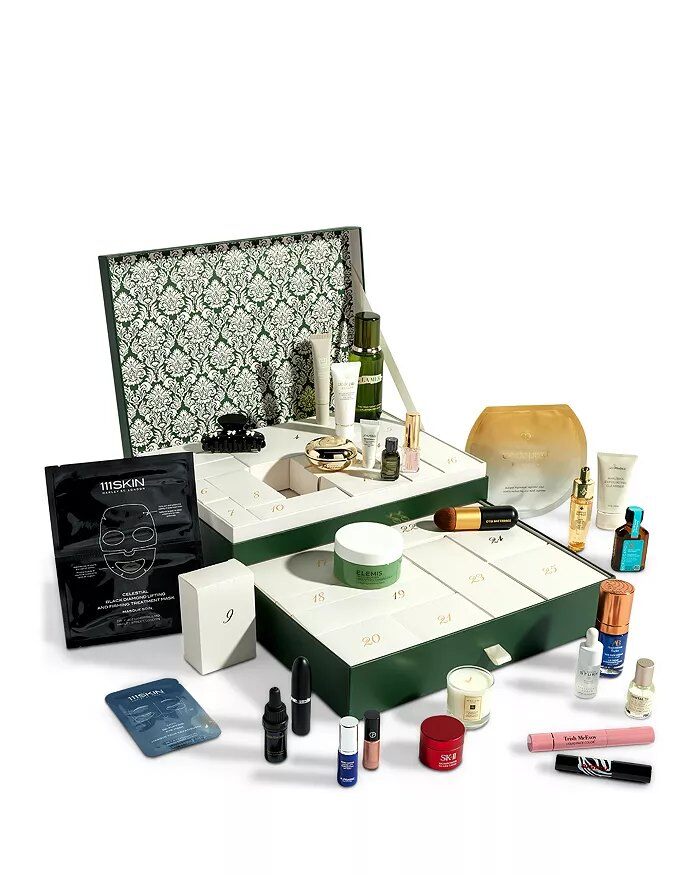 The Bloomingdale's 25 Days of Luxury Beauty Advent Calendar 2026, a green damask box surrounded by its beauty products