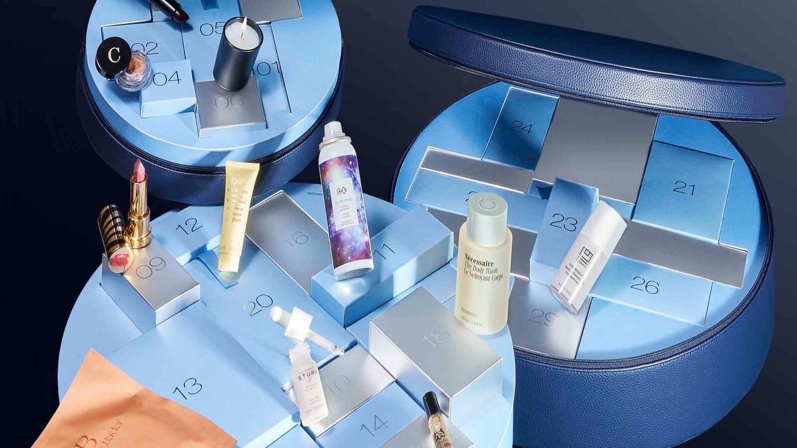 Bluemercury 31 Days of Dazzle 2026 advent calendar open with Augustinus Bader, R+Co and Sisley products