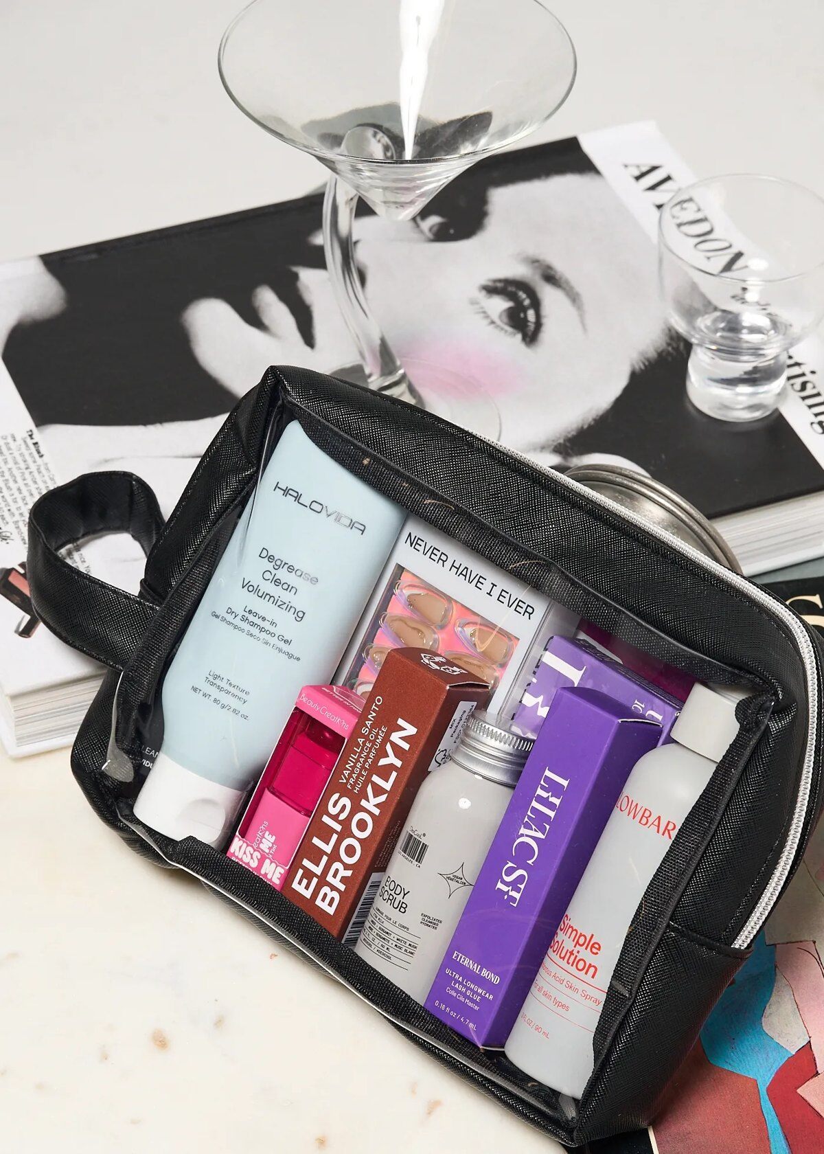 The BNTO Beauty Edit products packed in a black BNTO travel bag