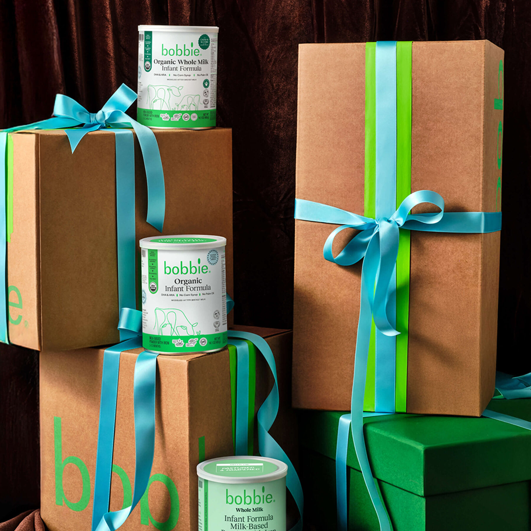 Bobbie formula cans wrapped as gifts