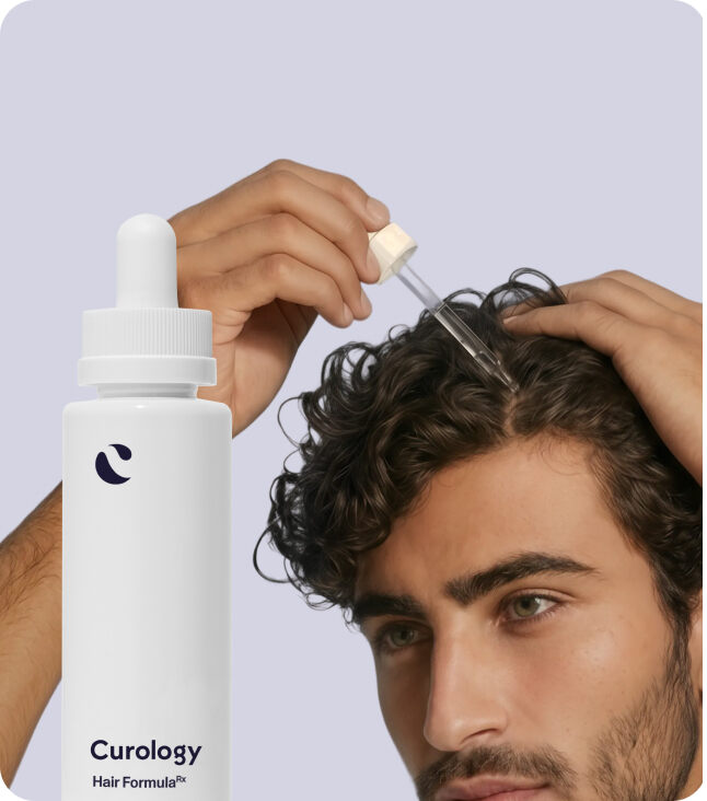 Man applying Curology hair formula