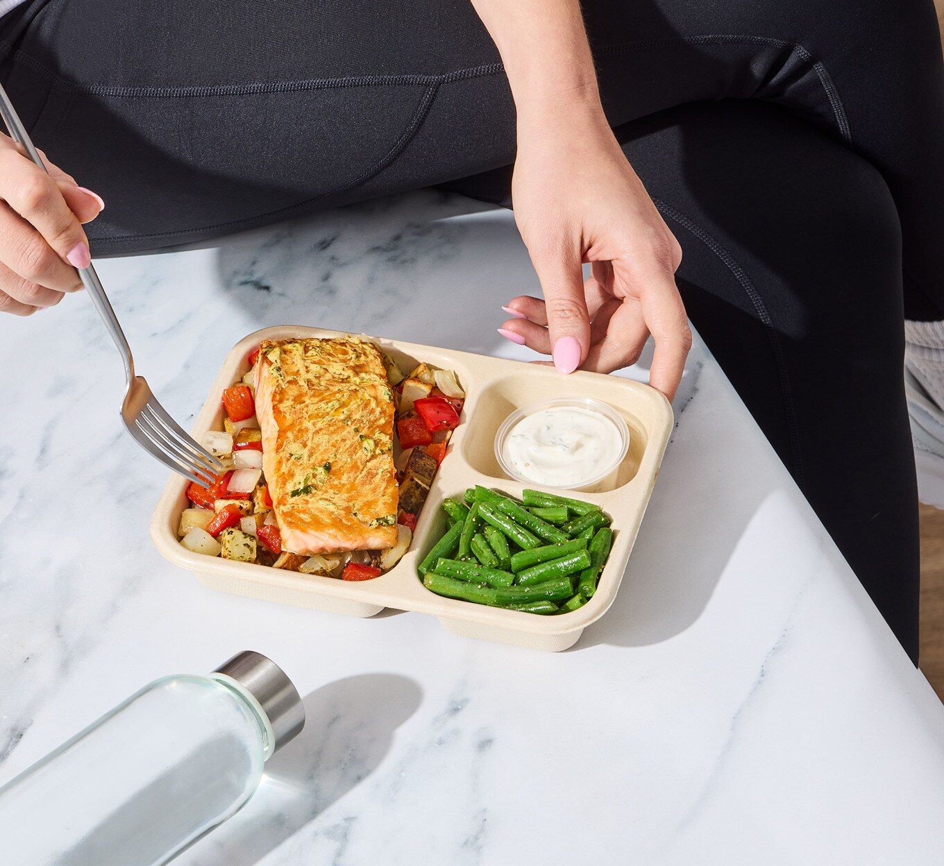 Factor meal tray eaten at a table