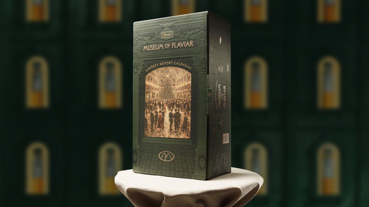 The Museum of Flaviar Whiskey Advent Calendar 2026, a tall green box with a museum gallery illustration, on a white pedestal
