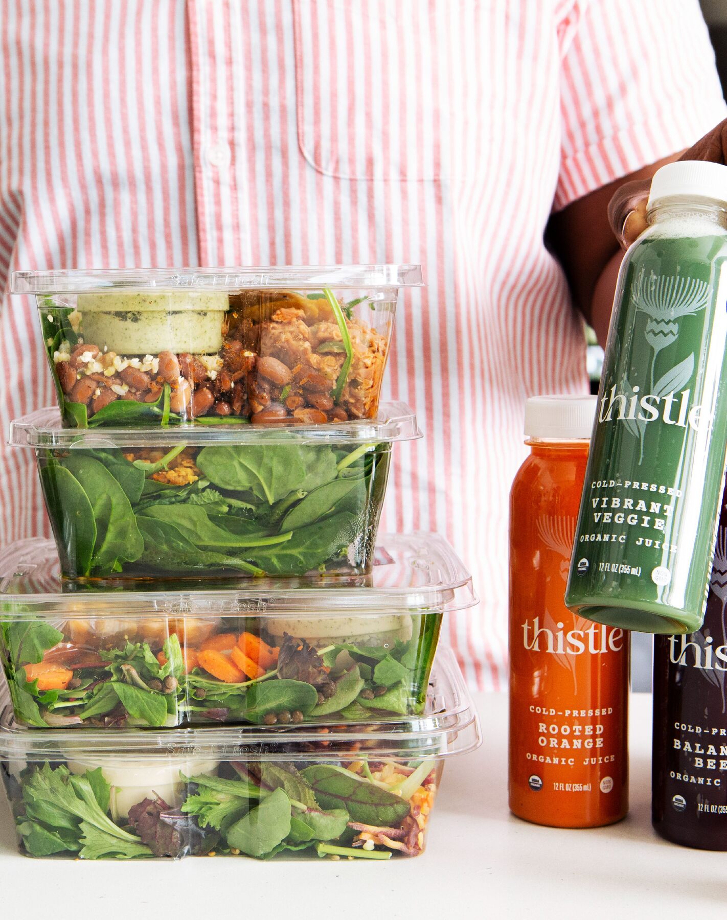 Customer unpacking fresh Thistle meals
