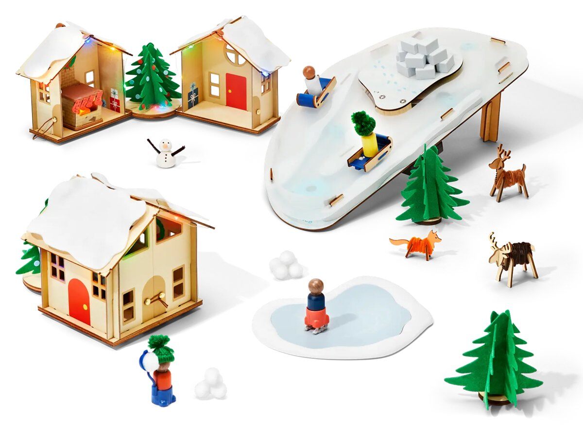 Finished KiwiCo Winter Wonderland Advent Calendar scene with houses, ice rink and trees