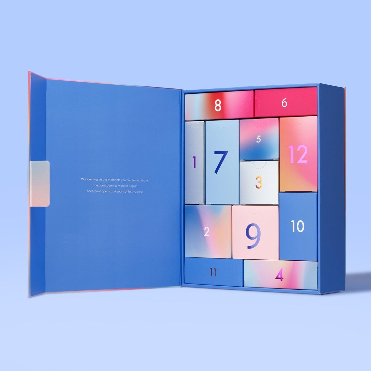 The LANEIGE 12 Days of Wonder advent calendar, a blue box with numbered doors