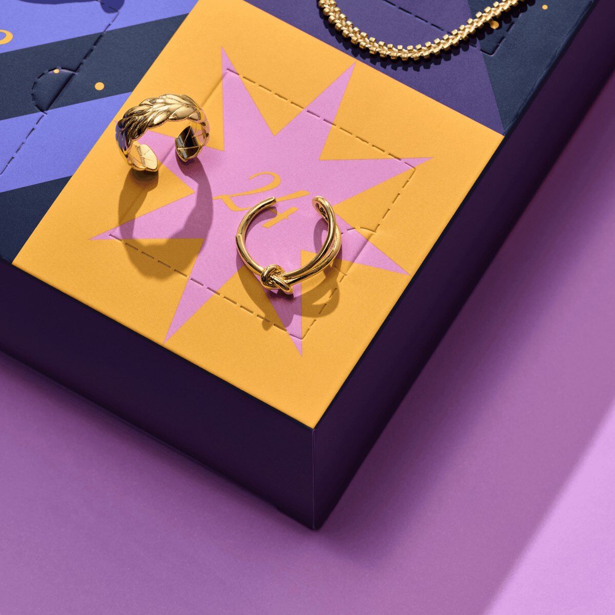 Open drawer of the Pura Vida advent calendar 2026 holding two gold rings
