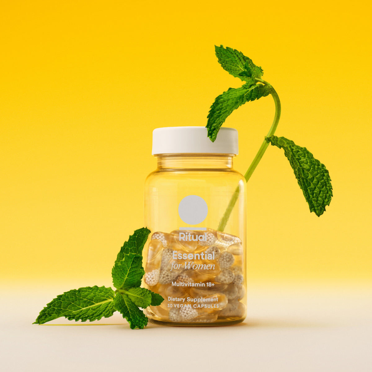 Ritual Essential for Women multivitamin bottle with mint
