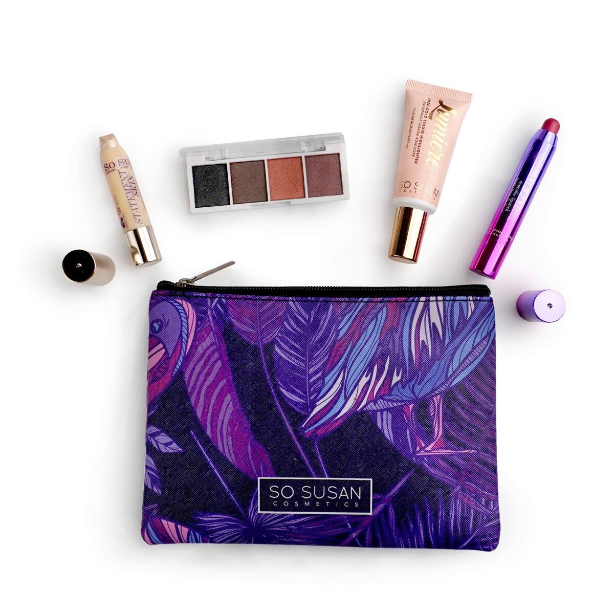 The So Susan Color Curate October 2026 bag, a purple patterned makeup bag with its highlighter, lip and eye products