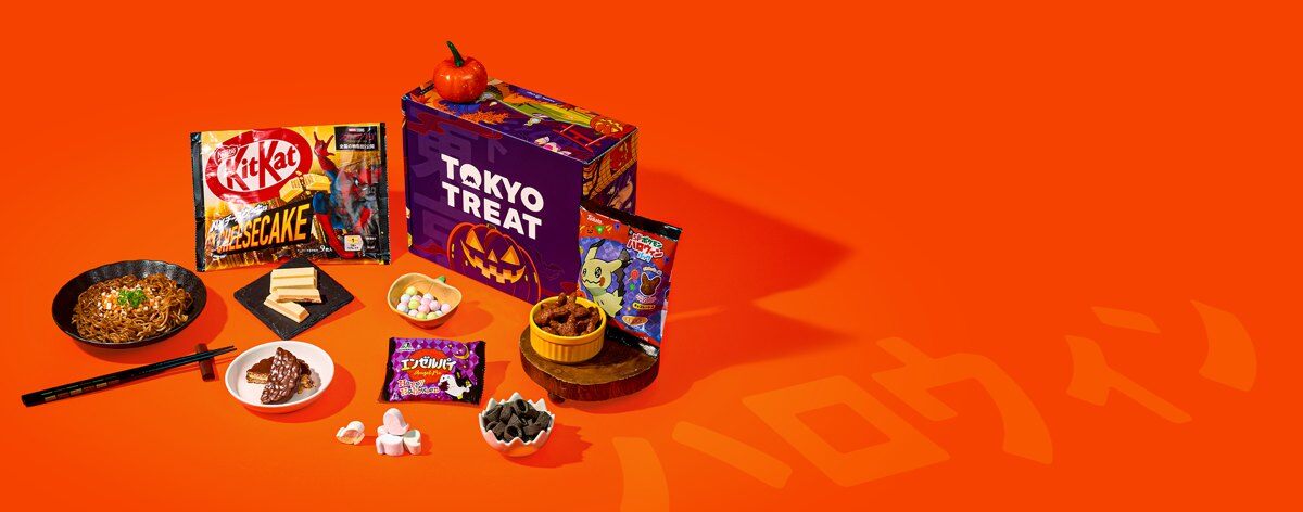 The TokyoTreat October 2026 box and its Halloween snacks, including KitKats and yakisoba, on an orange background