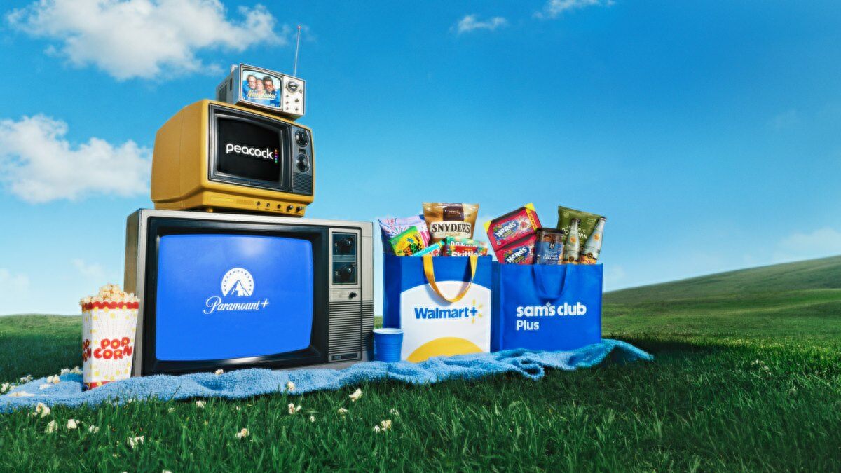 Vintage TVs showing Peacock and Paramount+ next to Walmart+ and Sam's Club Plus bags of snacks on a picnic blanket