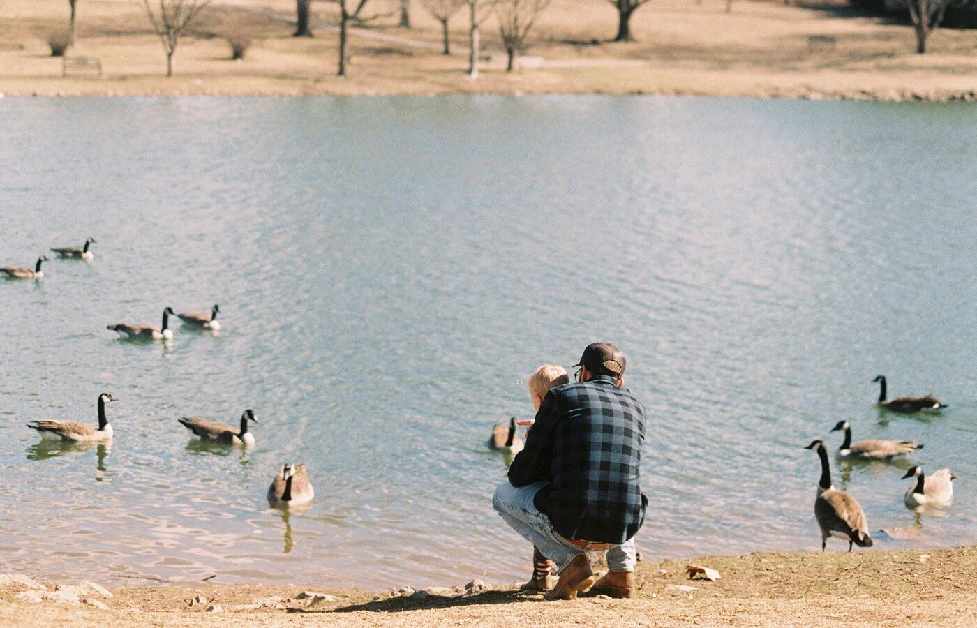 Woman by a lake with We Heart Nutrition vitamins